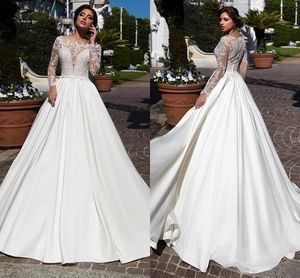 Abiti da sposa moderni in raso A Line Maniche lunghe Glamorous Bottoni applicati in pizzo Indietro Abiti da sposa Sweep Train Elegante Plus Size Desinger Robes de Mariee CL1178