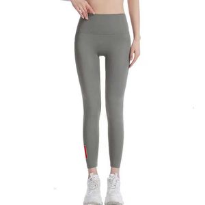 Kvinnors leggings kvinnor leggings yoga strumpor smala byxor lady mager byxa byxa utgifter hög midja sport capris designer benging s-2xl