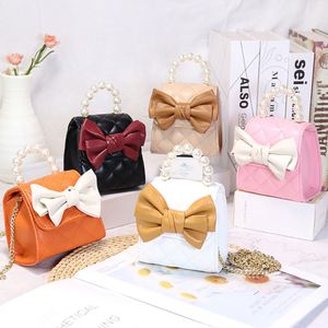 Ryggsäckar koreansk stil messenger väska bowknot personlig pärla handväska mini läppstift prinsessor plånböcker och handväskor barn handväska 220924