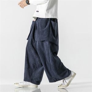 Spodnie męskie spodnie ładunkowe kieszenie boczne Męskie spodnie haremowe streetwear moda kobieta jogger dres mody luźne modyfikowane spodnie 5xl 220922