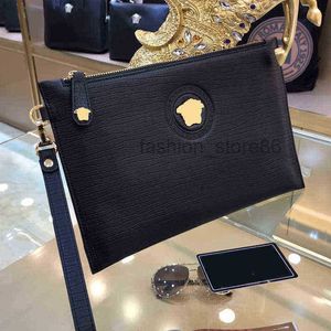 evening Bags Designer lady bag Guangzhou New Fashion Spirit Guy Beauty Head Men's Leather Handbag Large Capacity Clip Bag Men