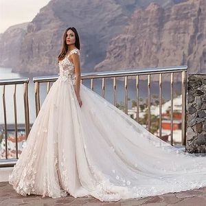 3D Kwiki kwiatowe A-line sukienki ślubne romantyczne suknie ślubne Sheer O-Neck Sexy Backless Lace Tiuld Sauld de Mariage Court Train Country Bohemian Vestidos