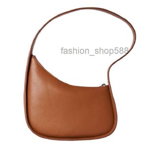 Pochette Bag Women Luxurys Designers Väskor High End Leather Shoulder Bag Women's Armpit Oregelbundet mode Portable Crescent Simple Hand Crossbody