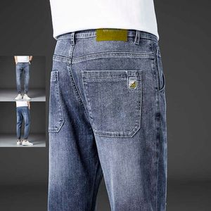 Jeans masculinos rasgados moda retro buracos desgastados soltos calças pequenas calças lavadas harém de harém de harém de nine ponto 220923