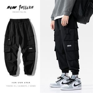 Herrsp￥rar streetwear svart herr harem joggar byxor m￤n last byxor hip hop casual fickor svettbyxor manliga ￶verdimensionerade modbyxor 220926