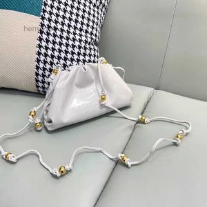 Evening Bags designer handbag new small golden ball cloud Fold bag hand held single room messenger lacquer skin women's bag dumpling handbags