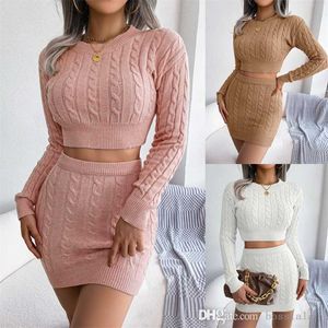 2022 Autumn And Winter Knitted Two Piece Dress Suit Leisure Fried Dough Twist Navel Sweater Buttock Skirt Womens Wear