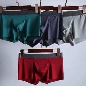 Kvinnors shorts Kvinnors sömlösa skärande bekväma män silkeslen andas tyg fast färg underkläderboxare