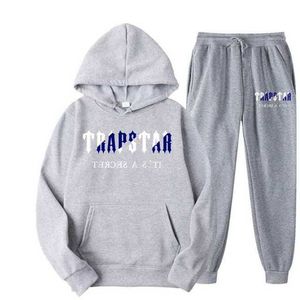 Traccetti da uomo Nuova tuta da tracce Menwomen Trapstar Stampa di abbigliamento sportivo Colori caldi con cappuccio con cappuccio da jogger pantaloni da jogger a due pezzi set G220928