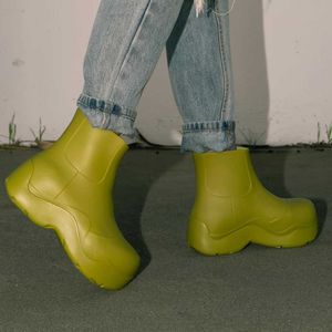 Vrouwen modern modeontwerp laarzen waterdichte solide eva regenachtig bootplatform platte niet chunky hiel sole dames sexy schoenen whosale
