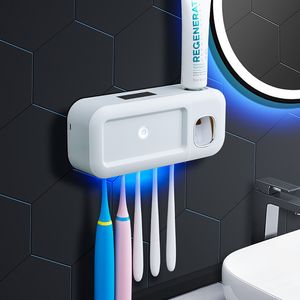 Portaspazzolino Supporto automatico a parete Distributore di spremiagrumi per dentifricio UV a energia solare Accessori per il bagno di casa 220929