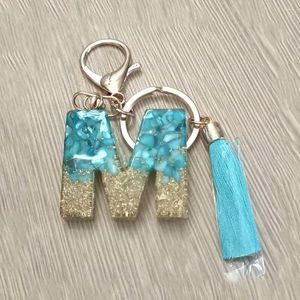 Chaves de ouro simples 26 letras pingentes de chaveiro com tamel azul Bolsa de garotas penduradas ornamentos A-Z Resina Chave de resina Acessórios