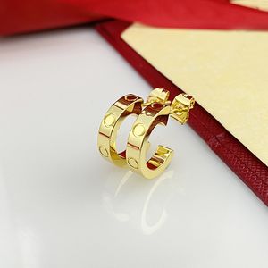 2024 marca designer de brincos de aço inoxidável para mulheres amor c forma oco ouro bling diamante anéis de orelha com cristal brilhante festa jóias de casamento