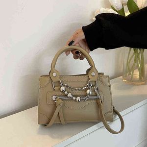 Handbag feminina 2023 Autumn e inverno Novo estilo Design bordado Pérola Pérola Chain Portátil Small Square Bolsa Pesquisa de Liquidação VENAGEM