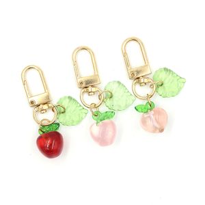 Commercio all'ingrosso Donne Ragazze Portachiavi Ciondolo Frutta Acrilico Mela Pesca Portachiavi Cerniera Tirare Charm Planner Charms Accessori Hangbag Ciondoli pendenti Portachiavi