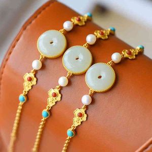 Designer de pulseira Natural Hetian Hetian White Jade Bracelet Chinese Retro Palácio Estilo Craft Unique Light Luxury Charm Jóias de prata feminina