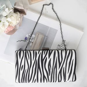 Bolsas de noite Messanger Mulheres Bolsas de verão cinzentas Padrão de zebra pequena embreagem crossbody hasp ombro bolsas de ombro designer 2022 bagsevening de luxo