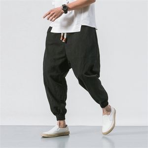 Calça masculina masculina de rua de corrida de jovens de linho de algodão casual solto homem harem harajuku homens de tamanho grande 5xl 220827