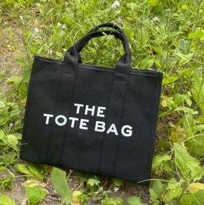 2024 The Totes Bags donna moda spalla shopping borse firmate famose borsa portamonete in pelle pu a lettera semplice di grande capacità borsa a tracolla casual cool grandi portafogli