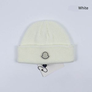 Designer lyxig stickad hatt mode unisex varm vindtäta andningsbara män och kvinnor vinter utomhus skalle cap 10 färger valfritt