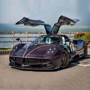 Diecast Model car 1 32 Pagani Huayra Dinastia Alloy Racing Fonde sotto pressione Giocattolo in metallo Sport Alta simulazione Suono e luce Regalo per bambini 221201