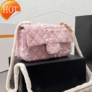 Damskie luksusowe projektanci torby na ramię 2023 Modna różowa przenośna worka na koperty teksturowa łańcuch pojedynczych ramion Crossbody Bag Factory Sale