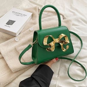 Winter 2023 new solid color retro texture single shoulder crossbody bag foreign style bow hand bag small square luxury designer brand P3