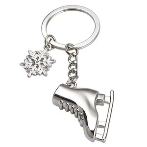 Metall skridskor nyckelringar vinter sport snöflinga charm nyckelringhållare väska hängningar mode smycken