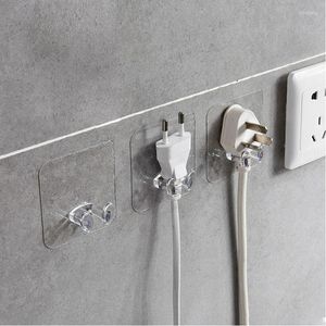 Krokar 1pc väggförvaringskrok Power Plug Socket Holder Adhesive Hanger Home Office nagelfri tråd transparent klibbig