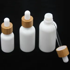 Bärbar Opal White Glass Bottle 15 ml 30 ml 50 ml med bambu dropper 1 oz trä eteriska oljeflaskor porslin