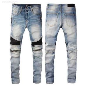 Herr jeans 2024 modedesigner jeans hip-hop lyxiga blixtlås hål tvätt jean byxor retro rivna vikar sömmar män design motorcykel ridande coola smala byxor