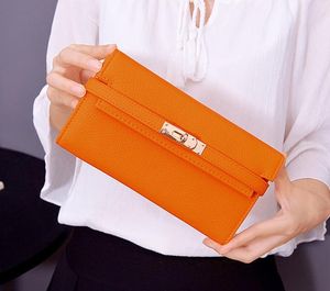 Nya kvinnor låser lång stil designer plånböcker 2023 lady telefon purses kvinnliga mode multikortkopplingar svart/rosa/orange/ljusgrå