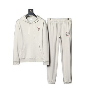 2022 Erkek Trailsuit Luxury 2 Parça Set Gündelik Hoodies Sweatshirt Sweatpants Suit Gençler Spor Baskı Jogging S-3XL Giyim Basılı Spor Giyim Markası Q136