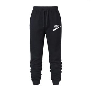 Vinter varm fleece byxor menthick casual termiska svettbyxor manliga byxor varum￤rke mode m￤n joggar varum￤rke logotyp tryck