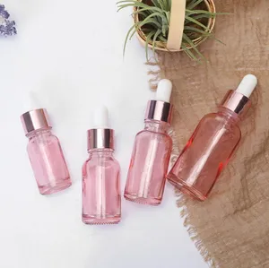 Cherry Pink Glass Essential Oil Parfume Bottle Exempel Vätskreagenspipettdropparflaskor med rosguldlock 10-50 ml