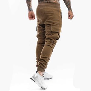 Pantaloni da uomo Pantaloni da jogging Pantaloni sportivi da uomo Pantaloni cargo casual Pantaloni da fitness Pantaloni sportivi skinny Pantaloni neri Pantaloni da uomo in cotone multi-tasca T221206