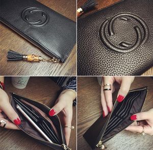 Quality cow leather zipper tassel women designer wallets super thin lady fashion casual zero purses female popular phone clutchs