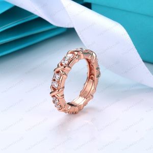 Diamante cheio de aço titânio e prata amor anel de luxo homens e mulheres anel de ouro rosa designer casal jóias presente com box172J