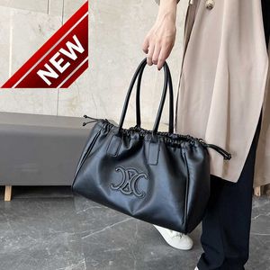 Designerväskor för kvinnor New Women's One Shoulder Foreign Style Versatile Hand Tote Bag Drawstring Large Capacity Shopping Soft Leather Factory Direct Sales