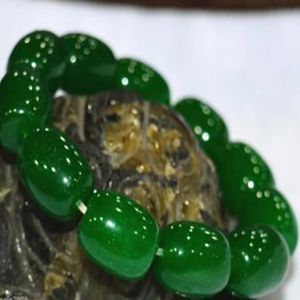 Neues heißes neues 8x12 mm grünes Emerald Zylindrisch elastisches Elastikarmband 7.5