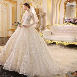 Elegante Brautkleider in A-Linie mit Spitze, durchsichtige lange Ärmel, Satinapplikation mit Pailletten, Sweep-Zug, Hochzeits-Brautkleid mit Knöpfen
