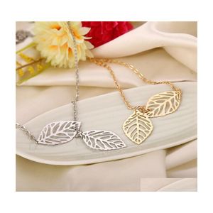 Pendant Necklaces Simple European Fashion Vintage Punk Gold Hollow Two Leaf Leaves Pendant Necklace Clavicle Chain Charm Jewelry Wom Dhkwj