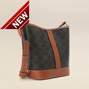 Borse firmate da donna in pelle vecchio fiore moda donna arco di trionfo secchiello 2023 nuova borsa a tracolla singola spalla di grande capacità vendite dirette in fabbrica