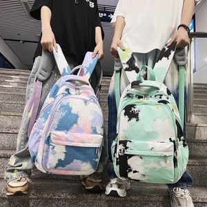 MACACA MACHA MACHA MACHA TIE-DYE ombros masculinos e femininos Estudantes universitários Backpack de gradiente de moda impressa