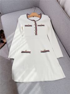 2023 Spring White / Black Contrast Color Panelled Knitted Dress Long Sleeve Round Neck Buttons Short Casual Dresses W2D080910