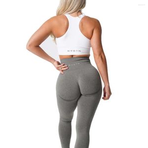 Pantalones activos NVGTN Curve Leggings de cintura alta para mujer Fitness sin costuras Yoga Control de barriga Ejercicio Color sólido