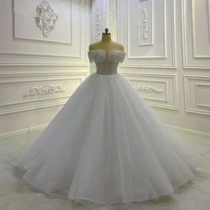 Luxury p￤rlstav prinsessan a-line br￶llopskl￤nningar 2023 av axel gillter crystal sn￶rning korsett kyrka brudkl￤nningar vestidos de novia