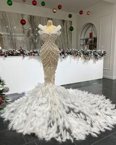 Luxury New Arrival Evening Dresses V Neck Sleeveless Sexy Pearls Beaded Lace Backless Hollow Feather Train Sequins Applique Celebrity Prom Dress Plus Size Tailored