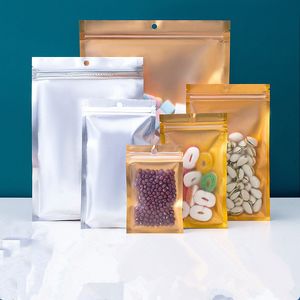 Leere 28-g-1-Unzen-Verpackung, geruchsdichte Mylar-Beutel-Verpackung, wiederverschließbare, essbare Beutel mit Heißsiegelung, durchsichtig, kleine MOQ-Personalisierung, goldener Druckverschlussbeutel