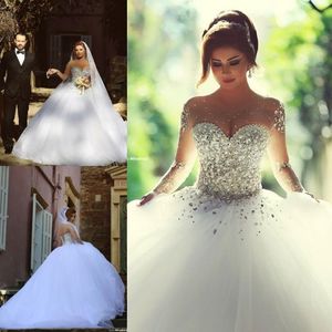 Spring luksusowe kryształowe sukienki ślubne suknie ślubne z kryształowymi koralikami linia Sheer Illusion Crew Neck Long Rleeves Długość podłogi Arabska